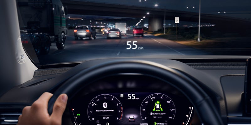View of the driver's dash in a 2025 Honda Pilot driving at night time