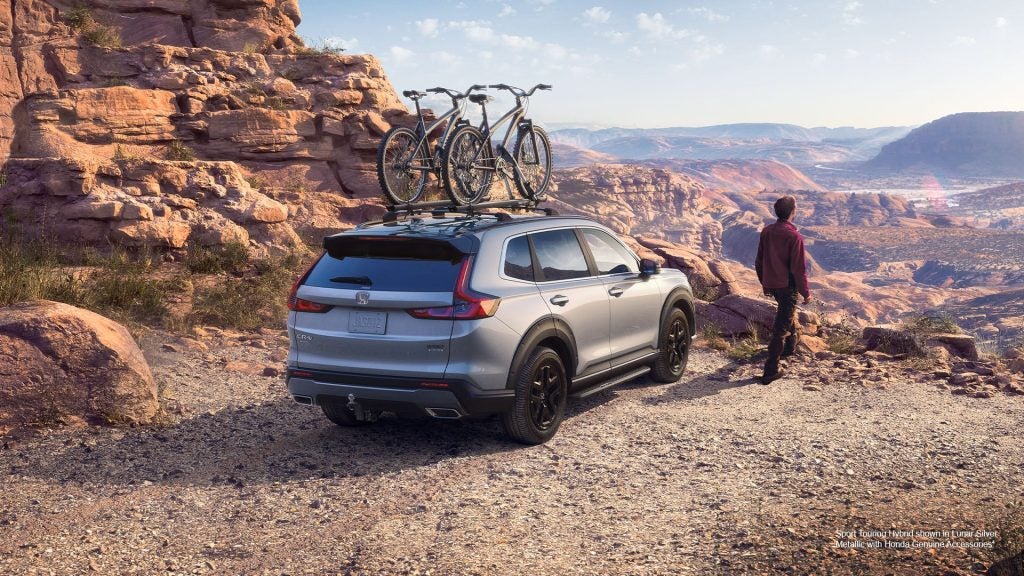 2023 Honda CR-V on dirt road looking down over a valley