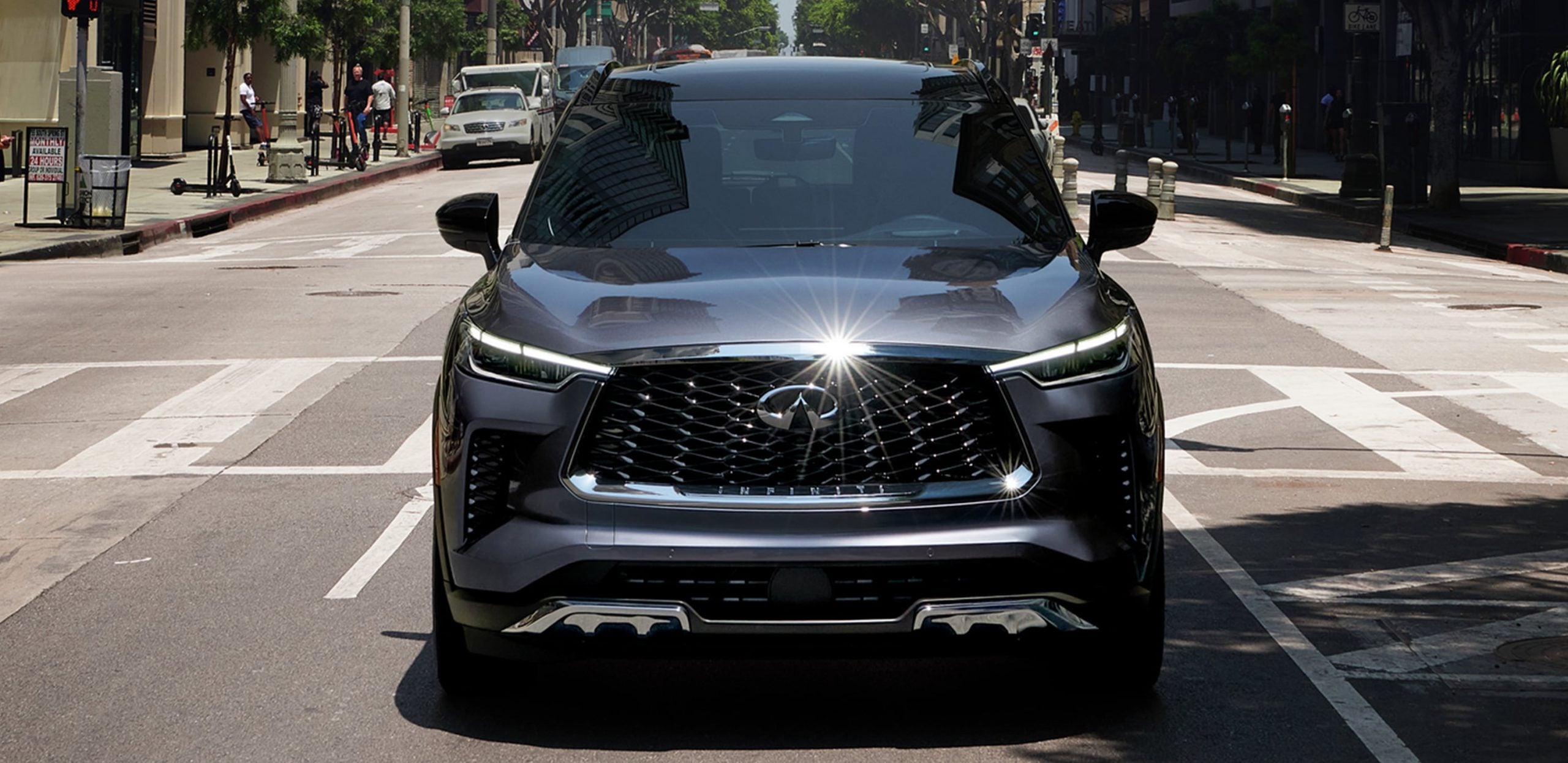 A 2022 Infiniti QX60 vehicle driving on the road
