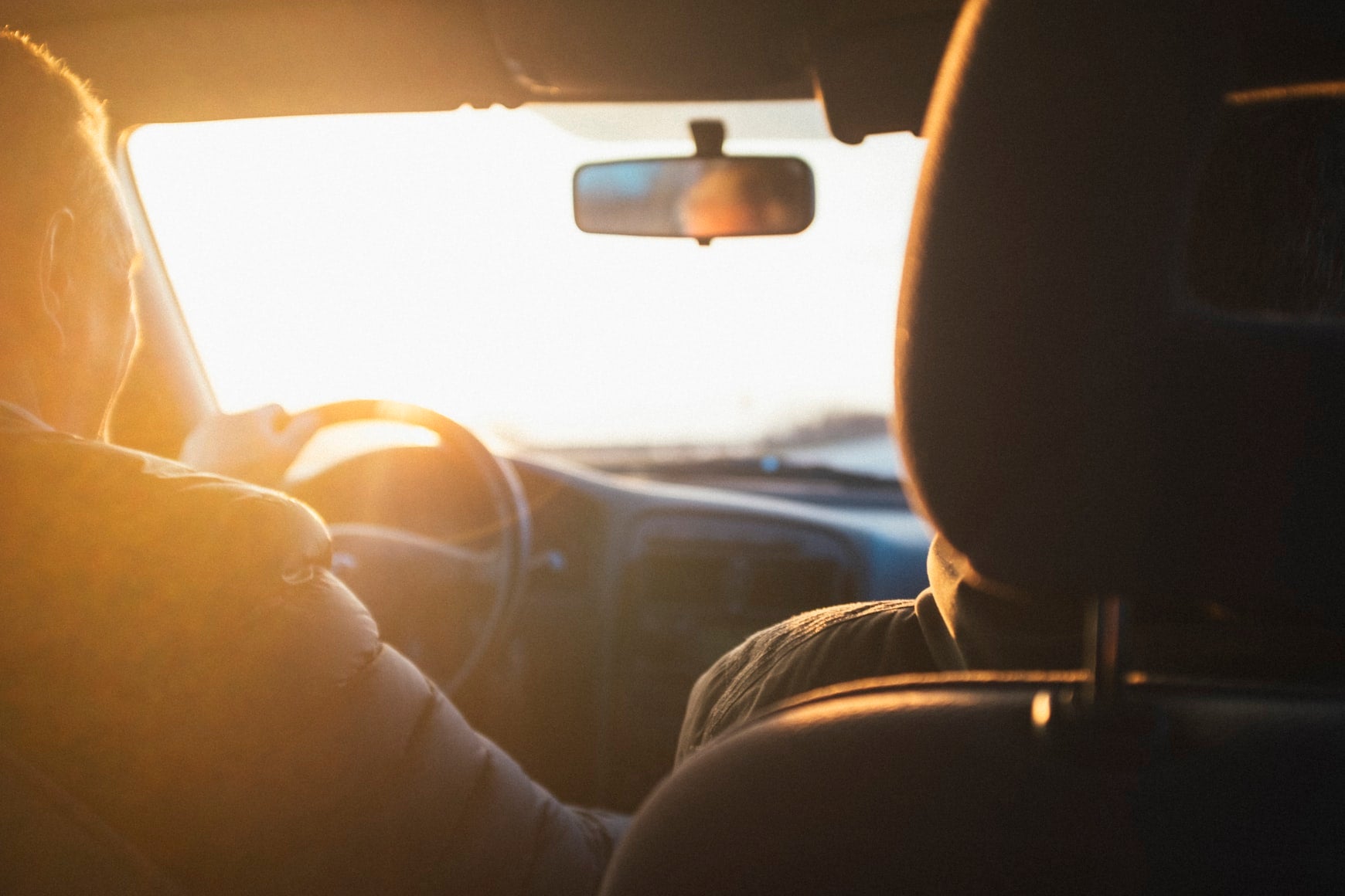People test driving a car