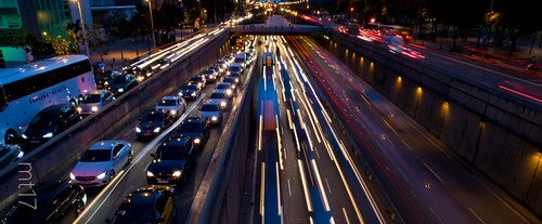 Overhead view of cars going both ways on a highway