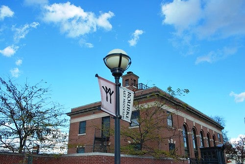 Rourke Art Museum with blue partially cloudy sky