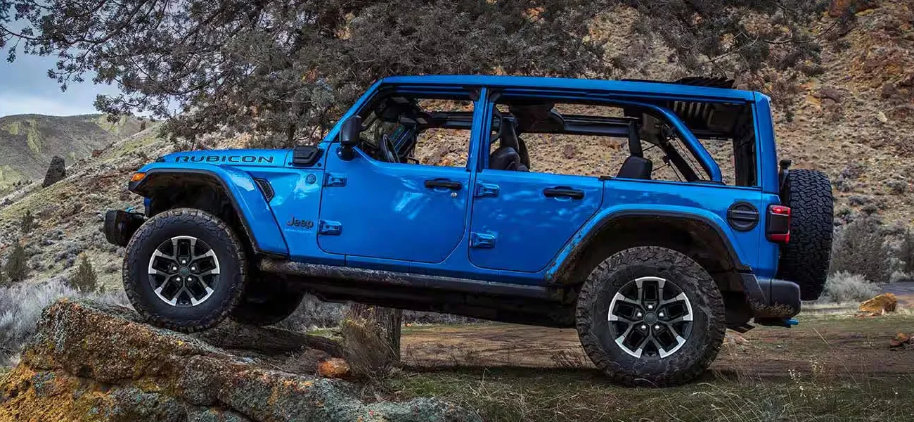 The 2025 Jeep Wrangler riding a hillside