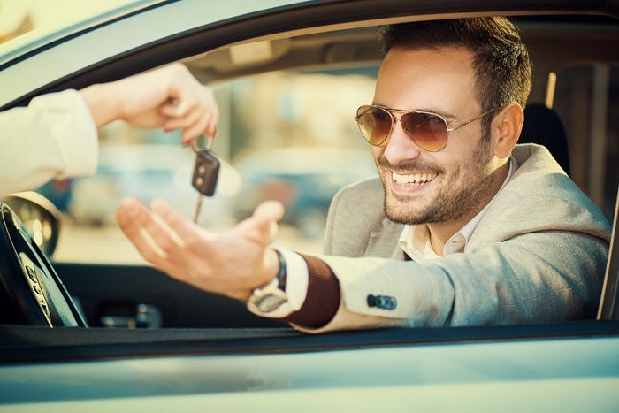 Man taking car key