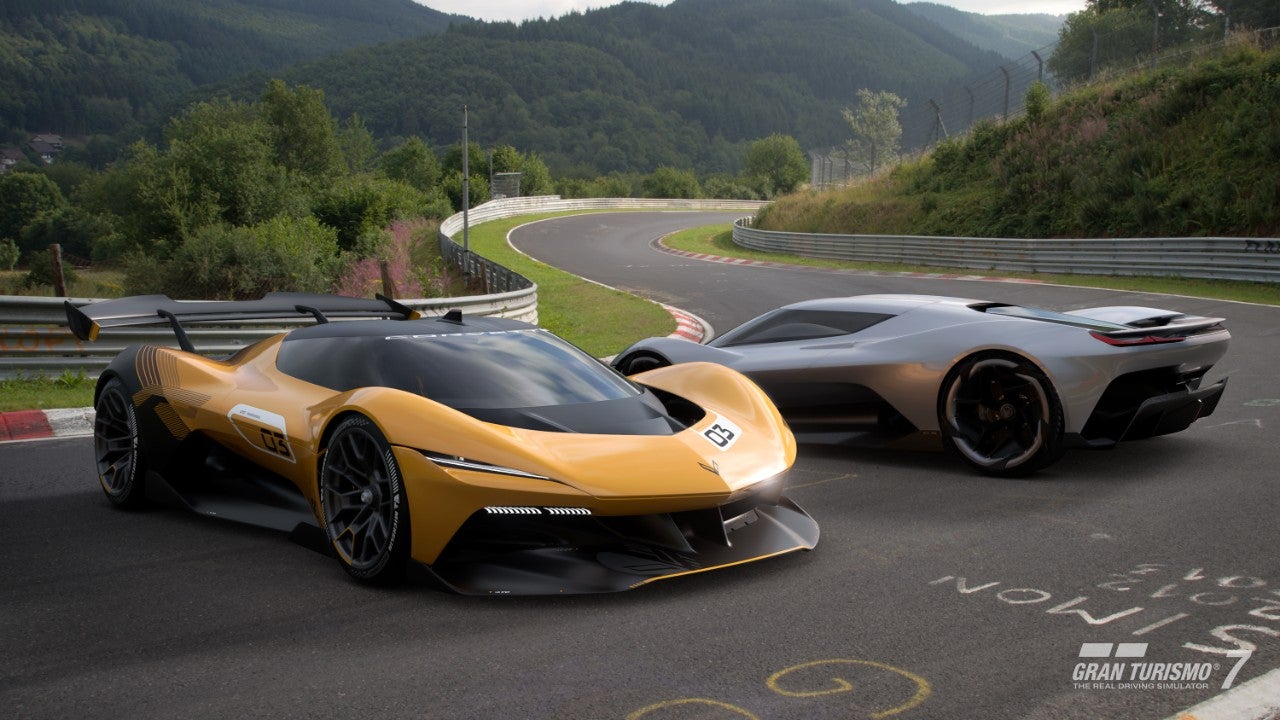 Corvette CX and CX.R Vision Gran Turismo Concepts The interior and bucket seats of a silver convertible sports car.