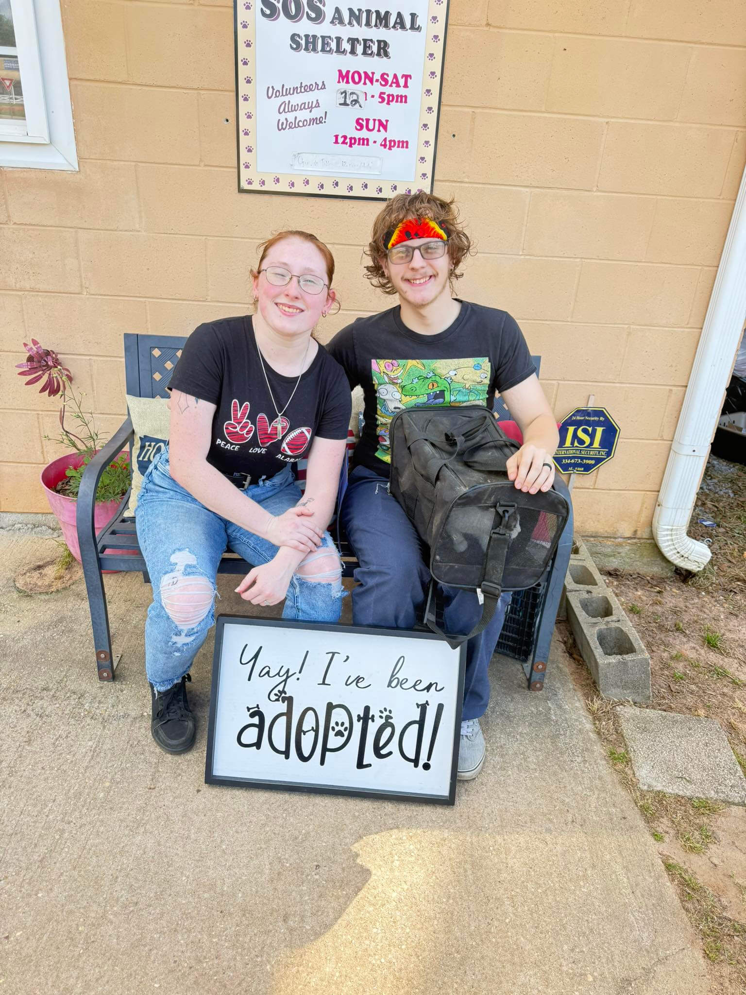 Woody, a Mitchell Hyundai Pet Spotlight cat, on adoption day at Save Our Strays Animal Shelter with his new family