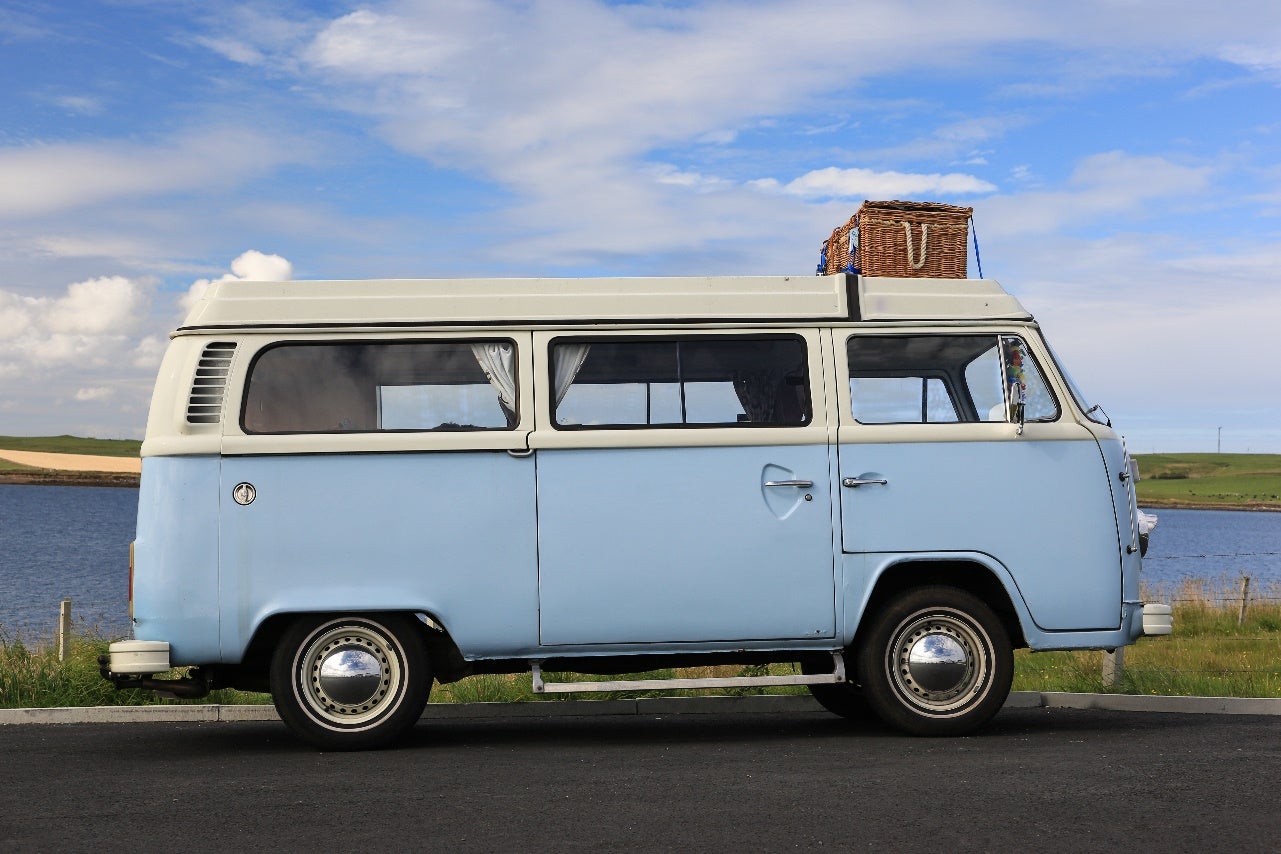 classic blue and white Volkswagen camper