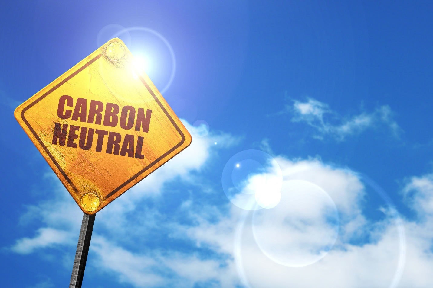 Carbon Neutral word on yellow traffic sign