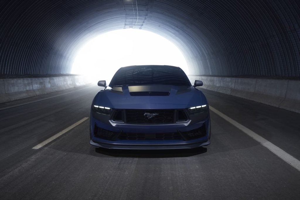 With sinister looks and a specially modified 5.0-liter V8 – the most powerful 5.0-liter V8 ever, projecting 500 horsepower – Dark Horse expands the Mustang lineup and sets a new benchmark for American street and track performance that could only come in a Mustang. Pre-production vehicles shown.