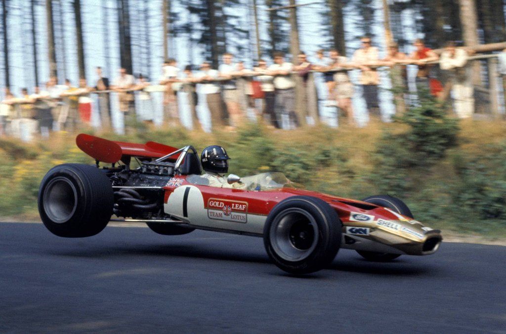 Formula One Racing Car catching air on the track