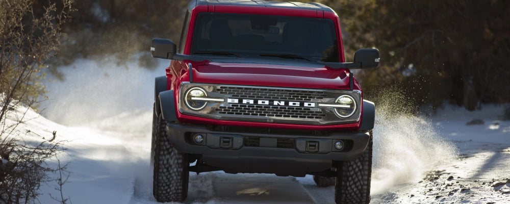 Ford Bronco driving in the Northland snow