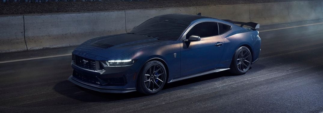 Blue 2024 Ford Mustang Dark Horse in a Tunnel