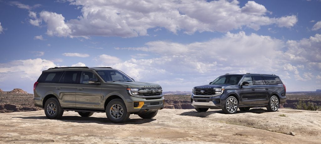 Two All-New 2025 Ford Expeditions On A Sandy Cliff