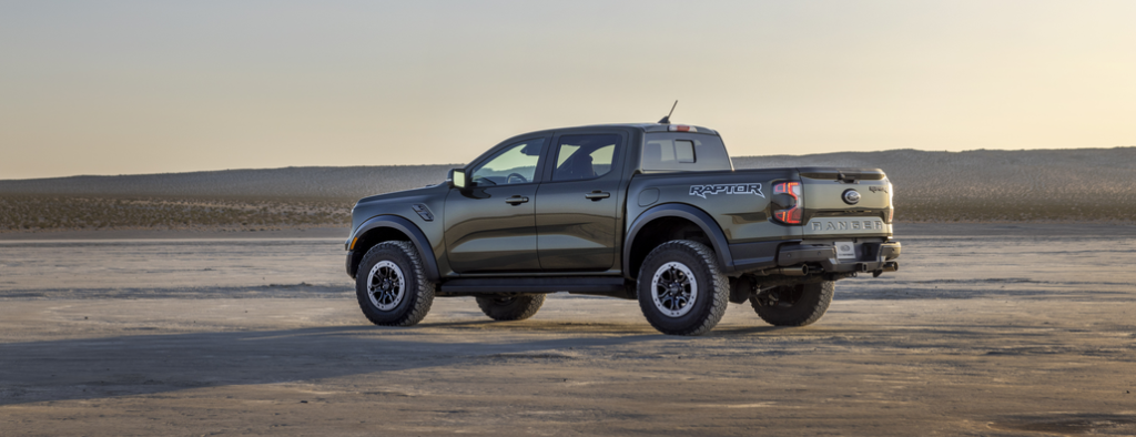 Ford Ranger Raptor Off-Roading in a Desert Rear 3/4 View