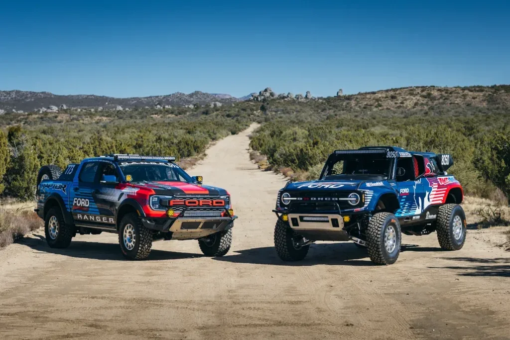 Ford Raptor Ranger and Bronco DR Parked on a Desert Road