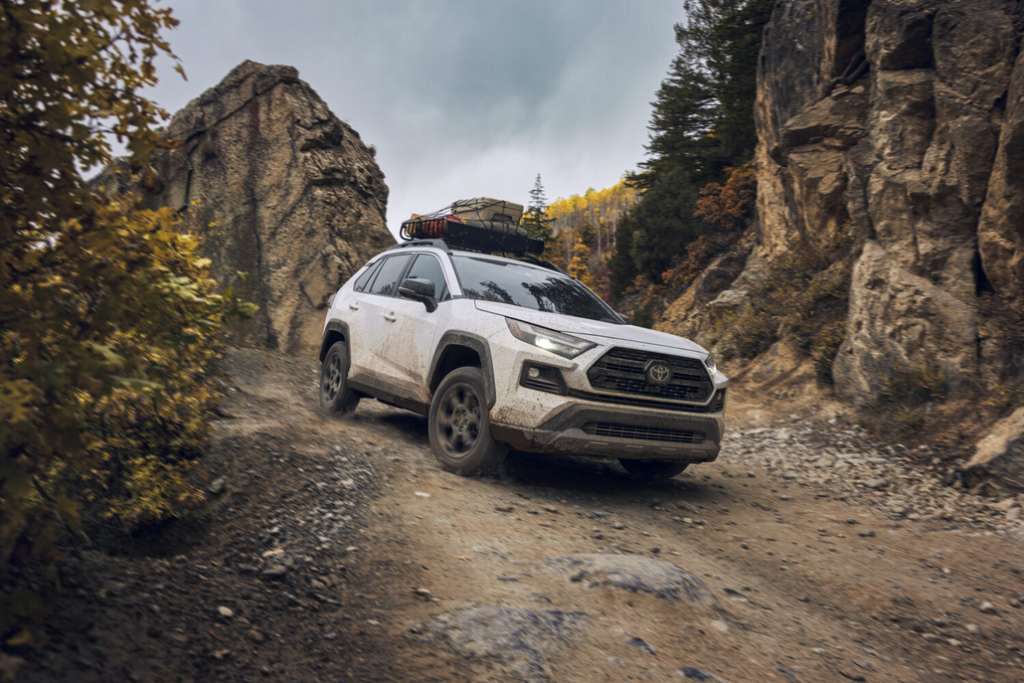 Toyota RAV4 Driving Down a Mountain Road Front 3/4 View