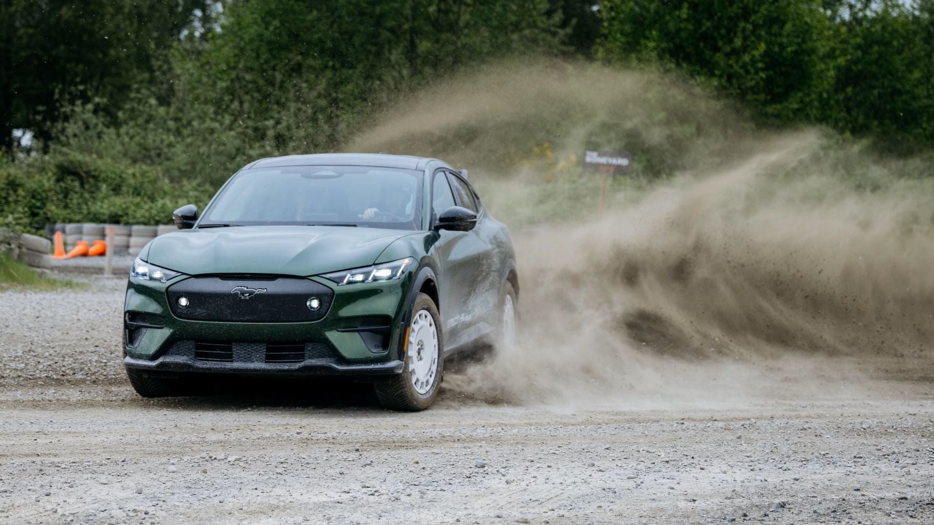 A Black 2024 Ford Mustang Mach-E Epically Drifting On The Race Track