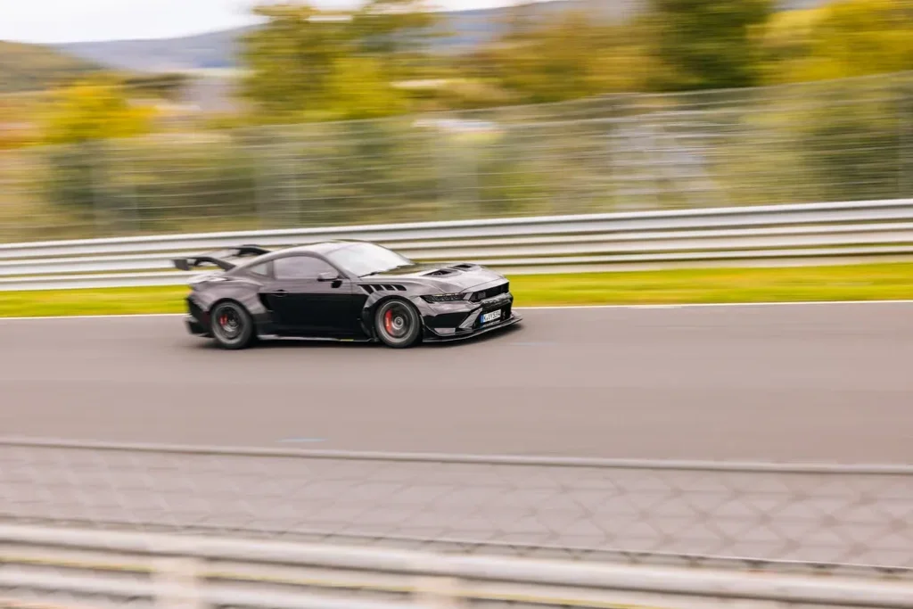Ford Mustang GTD Driving on a Racetrack Side View