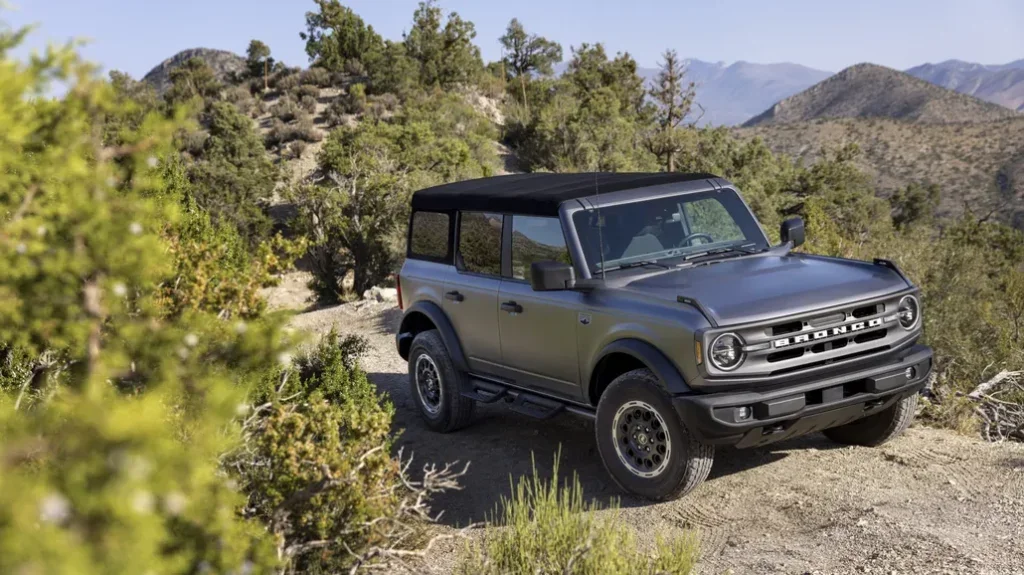 Ford Bronco Matte Parked Front 3/4 View on a Mountain Trail
