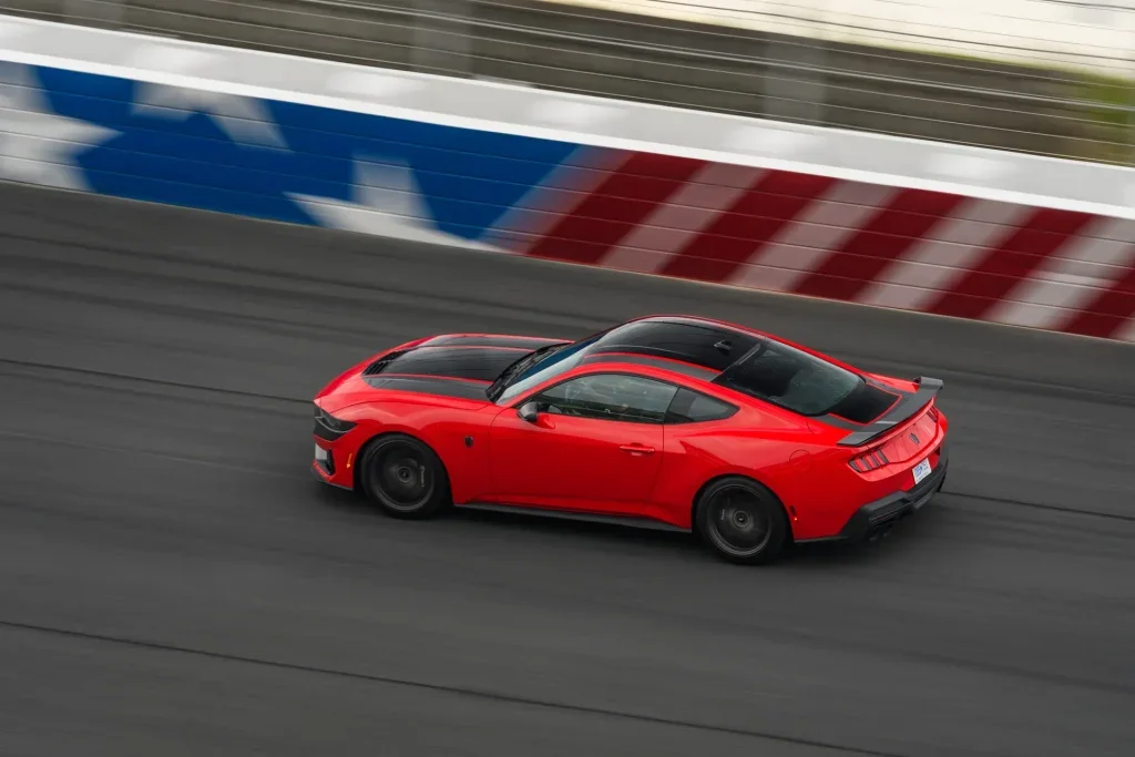 Racing a Ford Mustang on Charlotte Motor Speedway