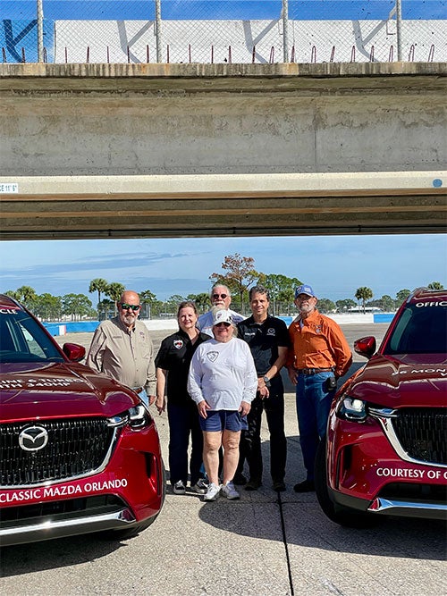 Photo of Mazda support vehicles and SCCA team at Sebring Raceway
