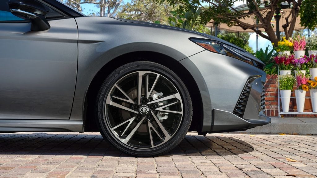 Close up of grey 2025 Toyota Camry's front wheel.