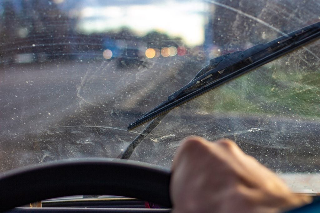 front windshield streaked with wiper blades