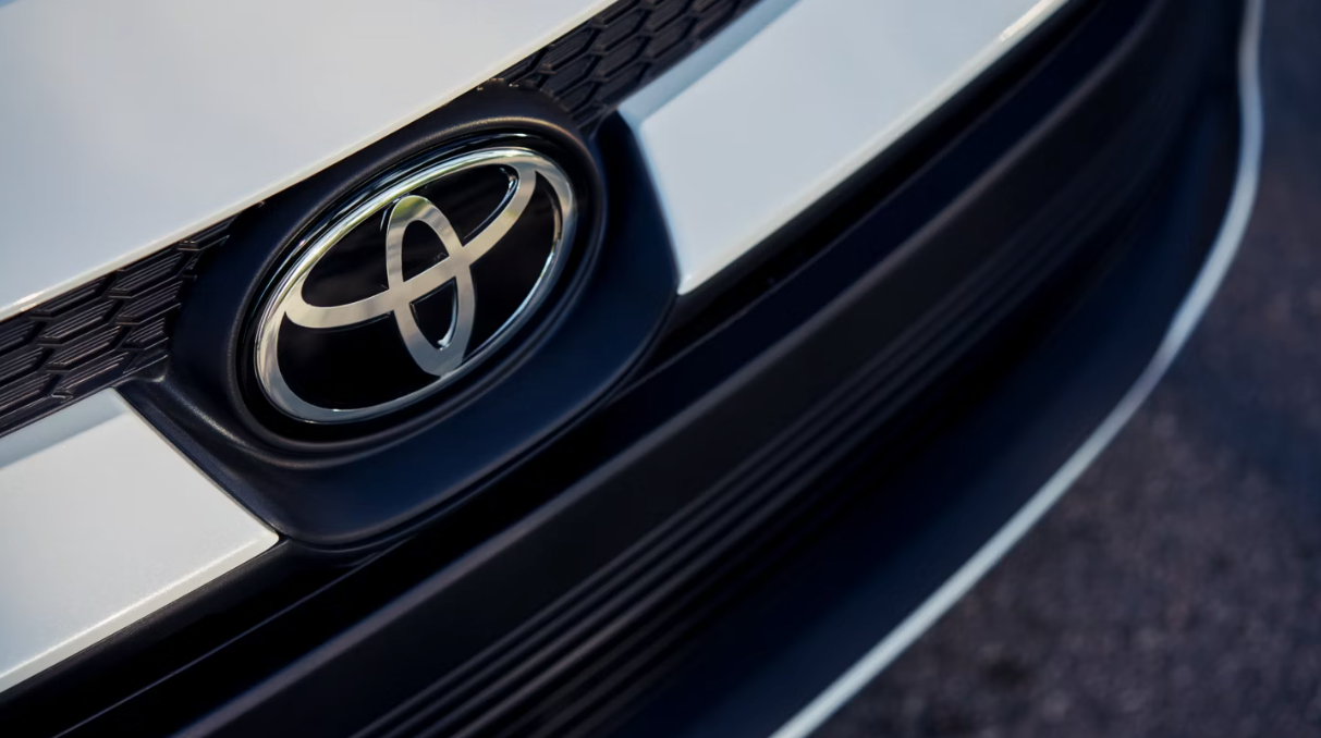 Up-close shot of the 2024 Toyota Corolla front grille featuring the Toyota logo