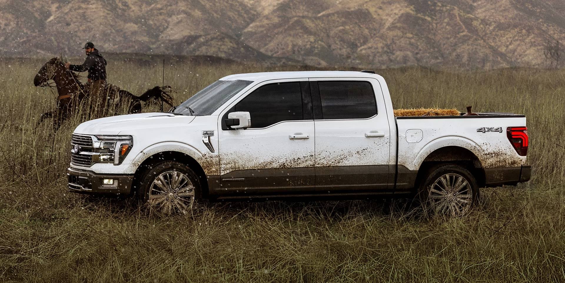 F-150 in a prairie covered in dirt.