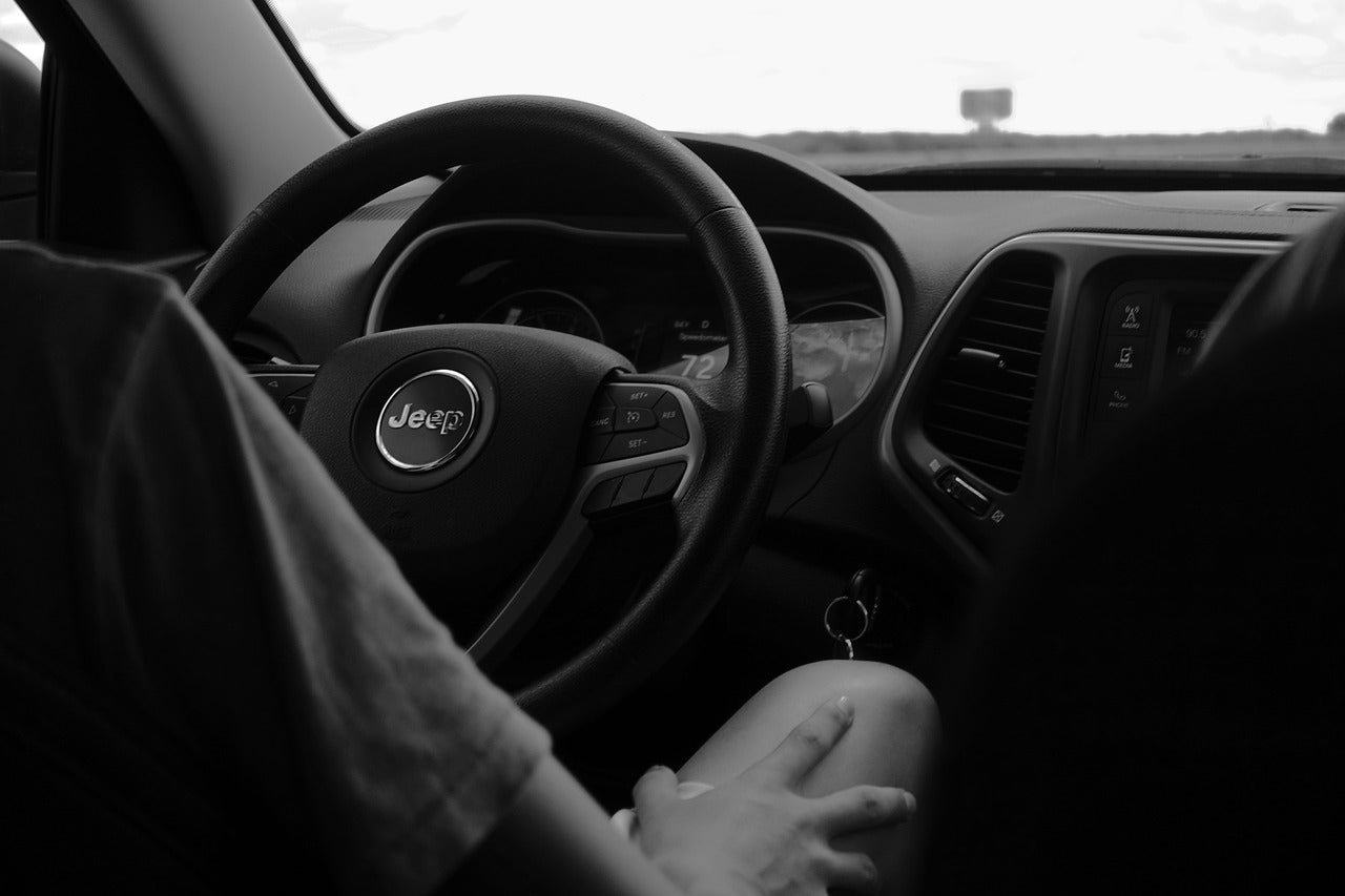 A Jeep dashboard in black and white
