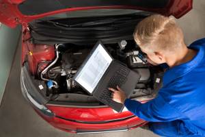 mechanic diagnosing engine problems