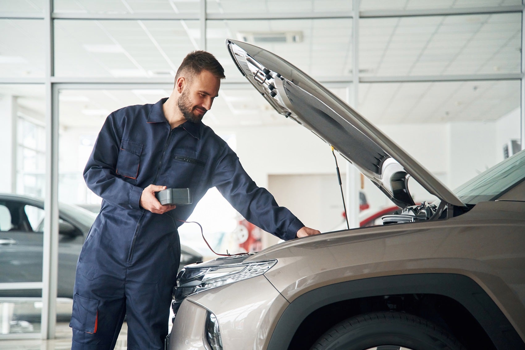 Village Ford service center staff servicing a vehicle