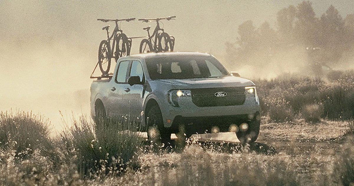 2025 Ford Truck with 2 bikes stored on top.