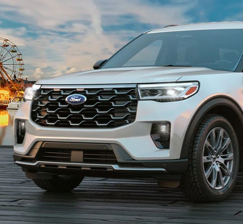 Ford SUV driving near amusement park