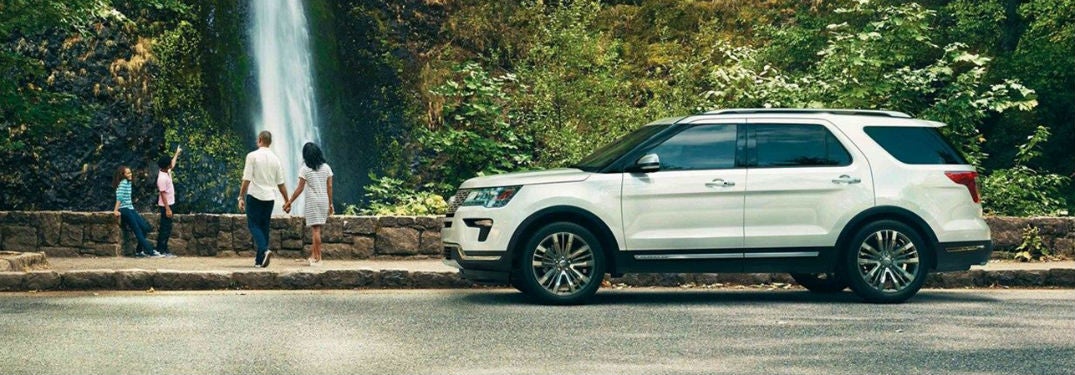 2019 Ford Explorer by waterfall with people