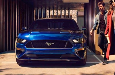 2018 Ford Mustang front fascia with couple walking on the side