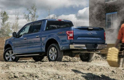 2018 Ford F-150 exterior back fascia and drivers side next to brick building