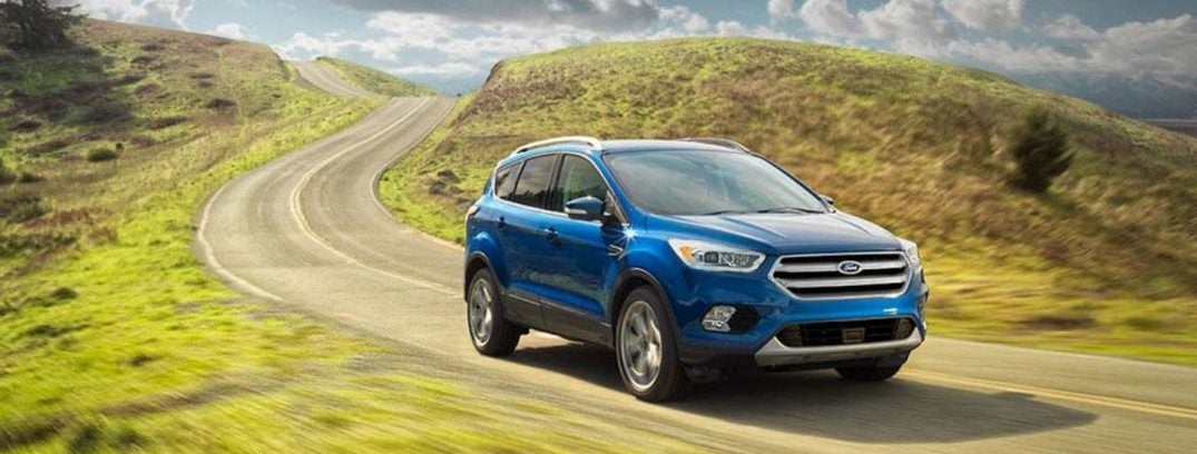 2017 ford escape performance exterior blue driving hilly road
