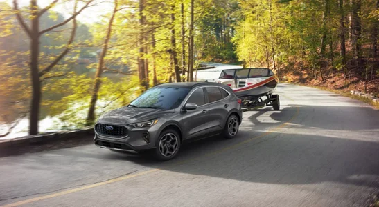 2026 Ford Escape towing a boat