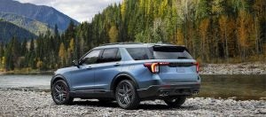 The 2025 Ford Explorer parked by the riverside. 