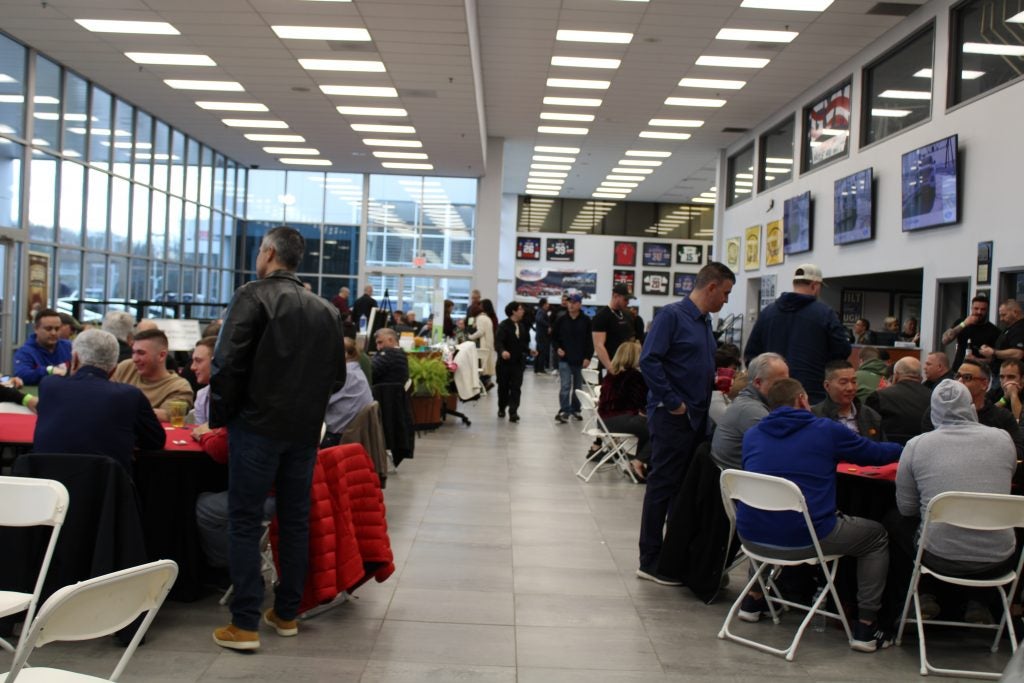 The All American Ford in Old Bridge showroom transformed into a poker tournament for the Charity Texas Hold' Em event The All American Ford in Old Bridge showroom transformed into a poker tournament