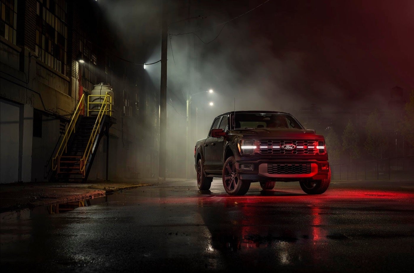 Ford F-150 Lobo pickup parked under a street light at night