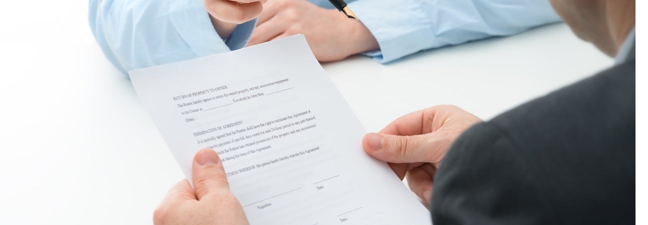 Man holding piece of paper