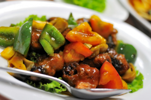 Asian cuisine including meat and colorful peppers and sauce in a bowl. | Chinese food in Ellisville, MO