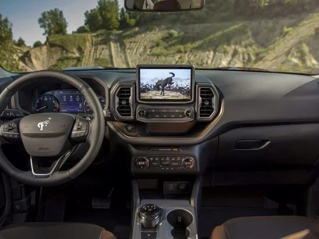 The steering wheel and front of a Bronco Sport