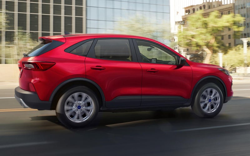 Is the 2026 Ford Escape a better compact SUV for daily driving around Candler, NC than the Subaru Forester?