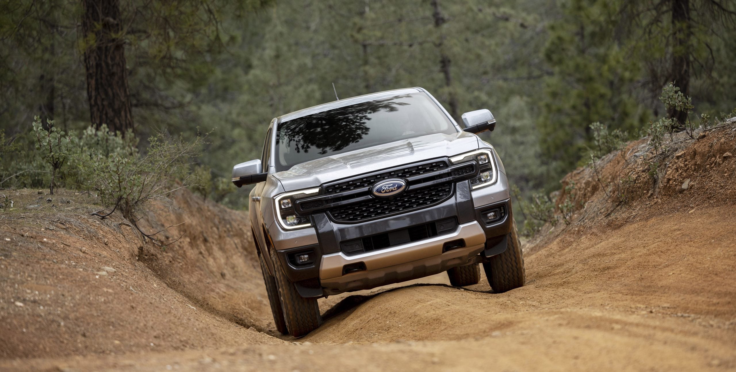 2024 Ford Ranger preproduction model shown. Available late summer 2023. Actual production vehicle may vary. Professional driver on closed course. Always consult the Owner’s Manual before off-road driving, know your terrain and trail difficult, and use appropriate safety gear.