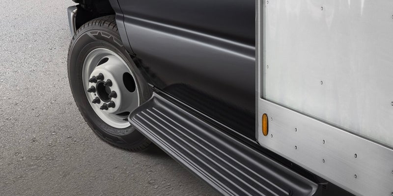 Close up of wheel and side panel of a 2025 Ford E-350 SD