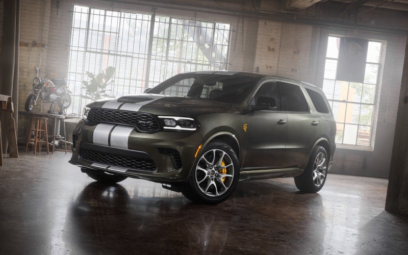 Which SUV - 2026 Dodge Durango or Ford Explorer - tows more for family trips around Bel Air, MD?
