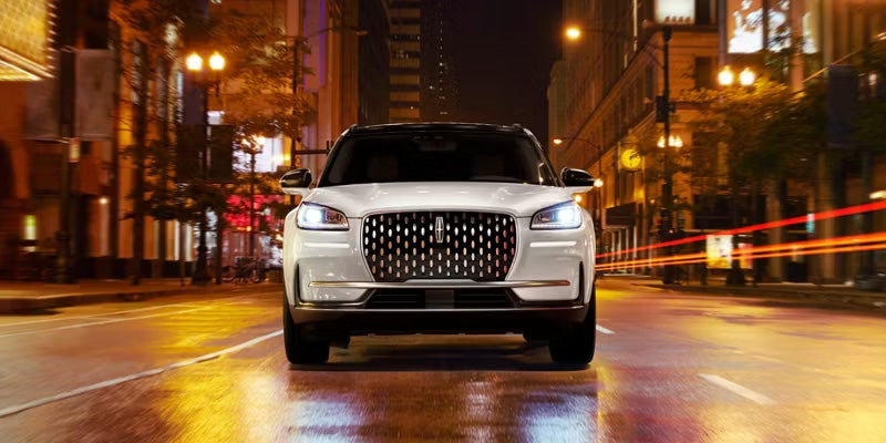 2026 Lincoln SUV cruising through Night time